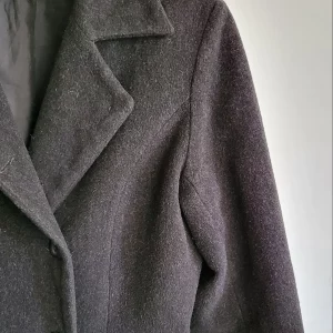 Manteau noir en laine